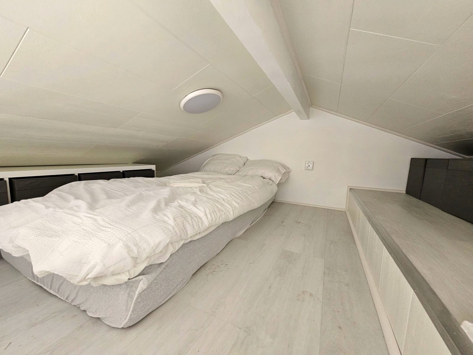 Loft bedroom in one of the compact houses