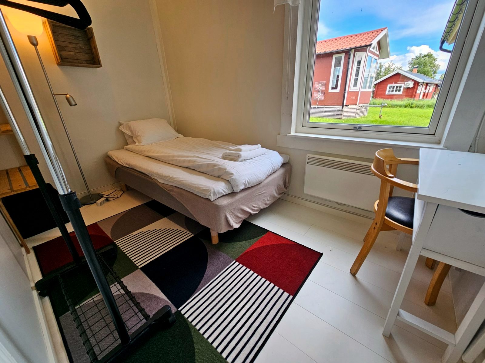 Bedroom in the larger main residence