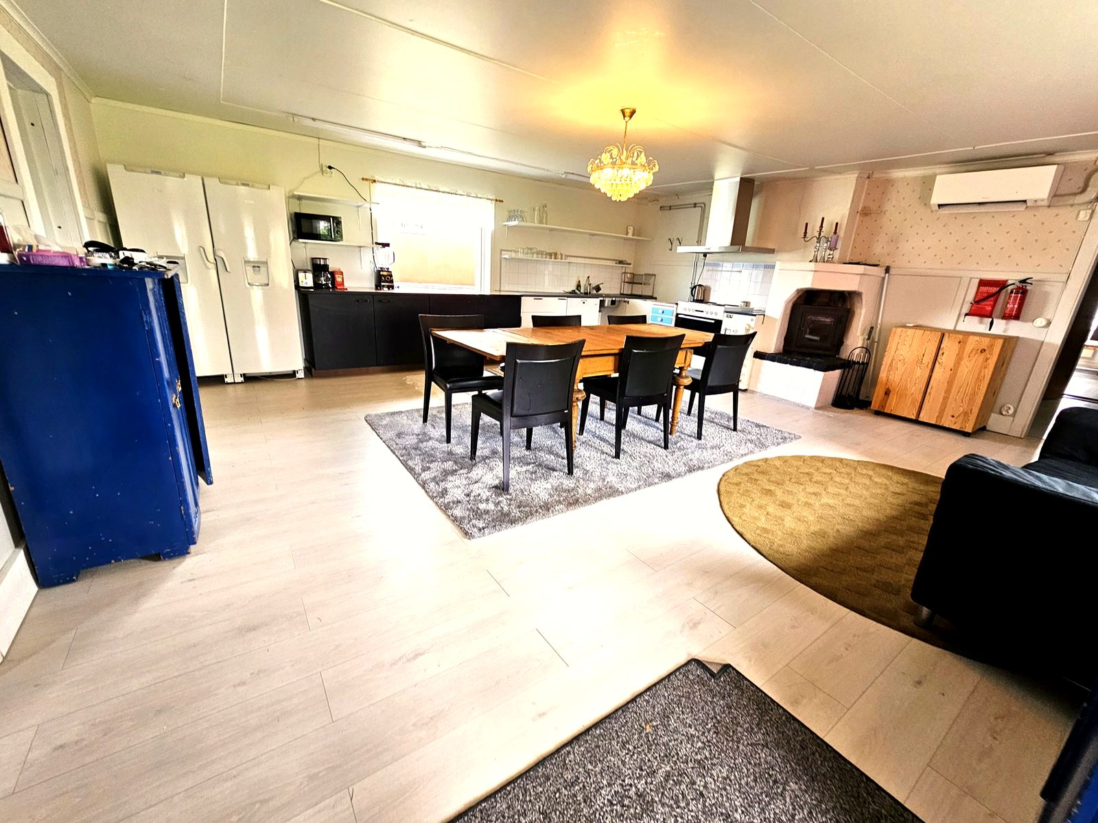 Large shared kitchen and living space in the main residence