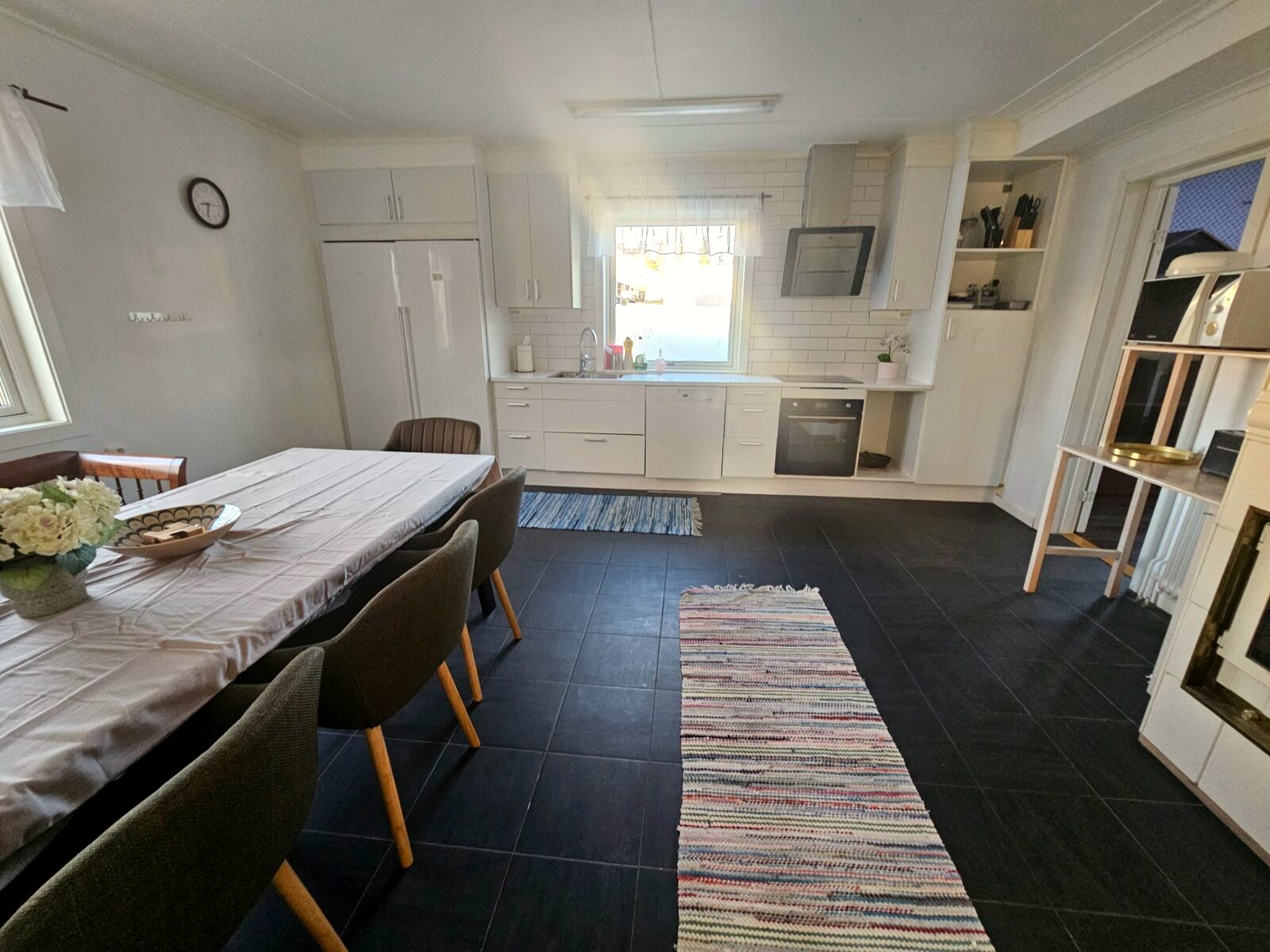 Bright furnished kitchen and dining area in corporate housing in Kiruna